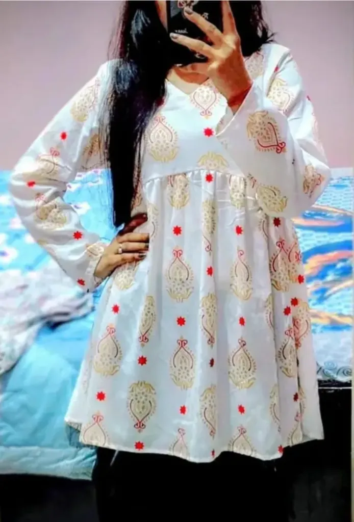 Gold printed motifs as the long kurti top